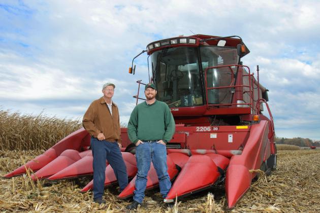 Men in front of tractor